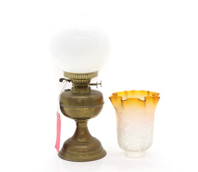 Lot 475 - A brass oil lamp