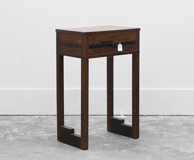 Lot 538 - An Art Deco satined beech and ebonised lamp table