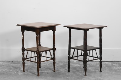 Lot 528 - Two similar walnut lamp tables