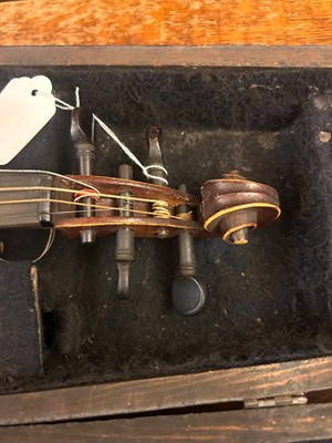 Lot 353 - A Continental cased violin and bow