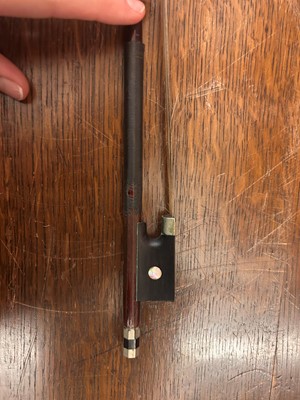 Lot 353 - A Continental cased violin and bow