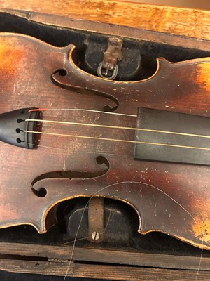Lot 353 - A Continental cased violin and bow