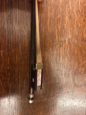 Lot 353 - A Continental cased violin and bow