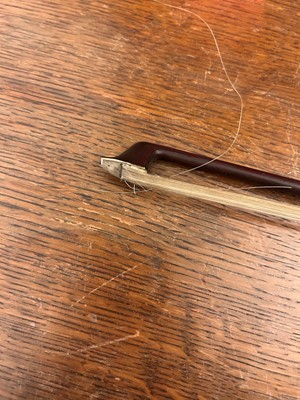 Lot 353 - A Continental cased violin and bow