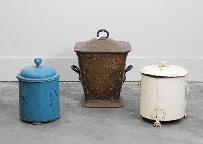 Lot 327 - An Arts and Crafts embossed copper log bin and cover