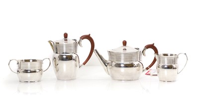 Lot 9 - A silver four part tea service