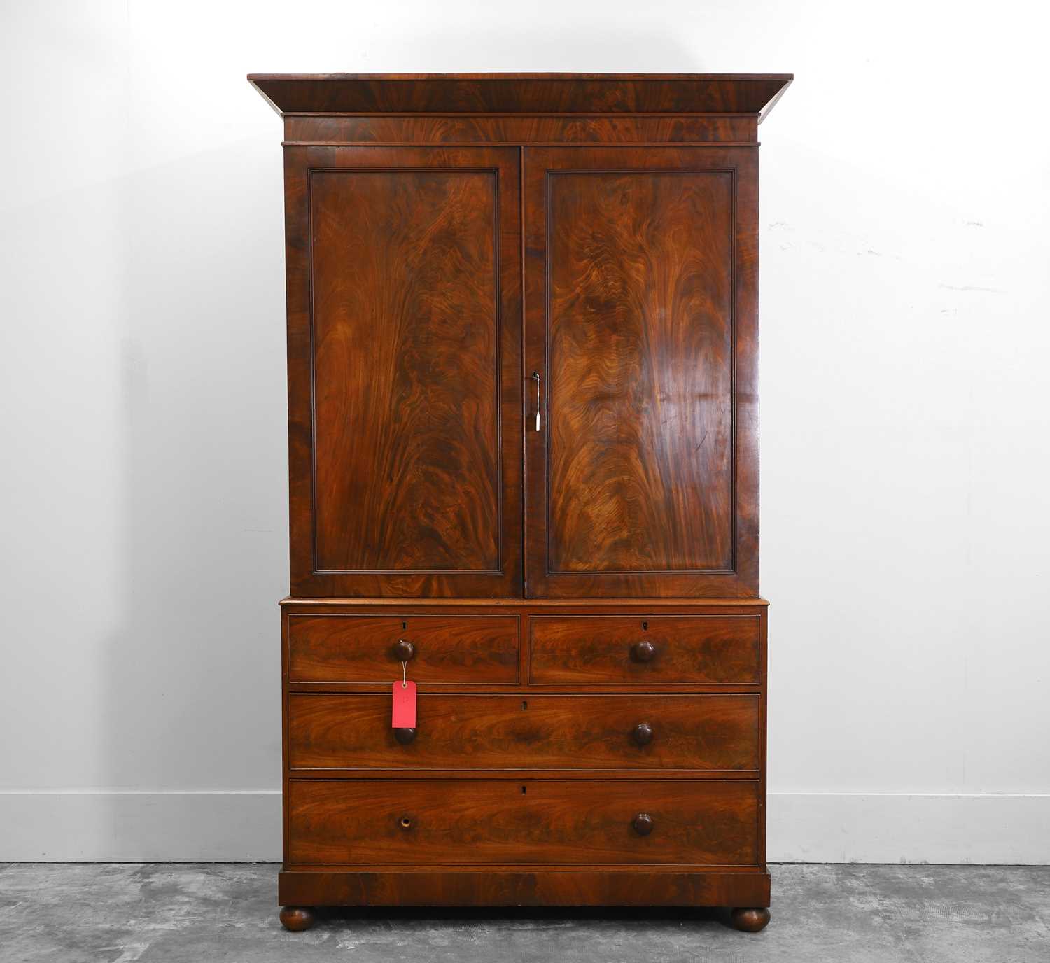 Lot 510 - A mahogany press cupboard