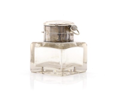 Lot 11 - A silver-mounted combination timepiece inkwell