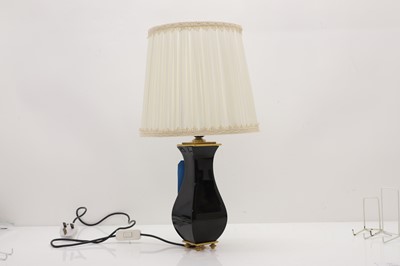 Lot 471 - A Baccarat black glass and gilt-bronze table lamp