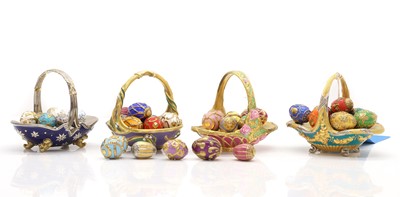 Lot 104 - A collection of Faberge style eggs