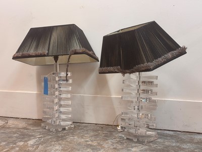 Lot 474 - A pair of clear Lucite table lamps