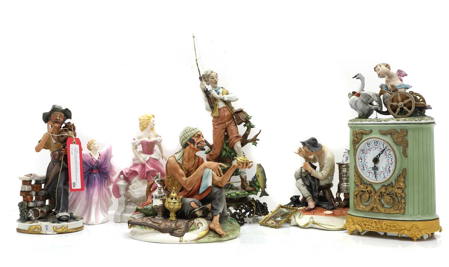 Lot 129 - A collection of four Capodimonte figures