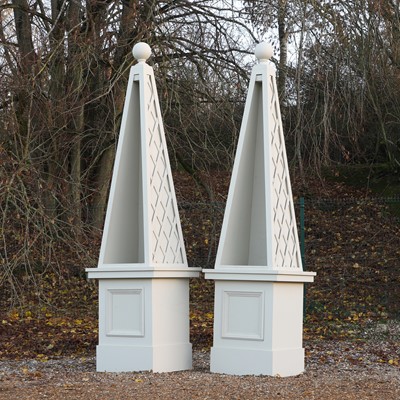 Lot 24 - A pair of large modern painted wood obelisk display cases