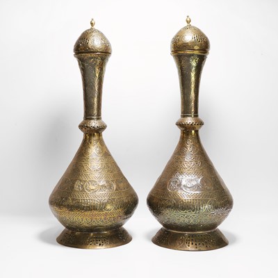 Lot 335 - A pair of large brass urns and covers
