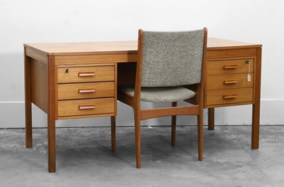Lot 518 - A Norwegian teak desk