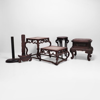 Lot 9 - A collection of Chinese hardwood stands
