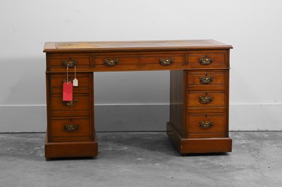 Lot 520 - A Victorian walnut pedestal desk