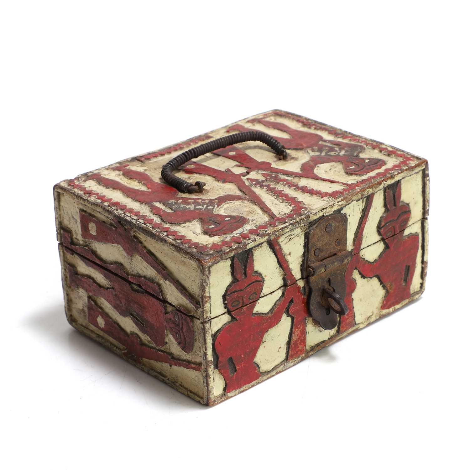 Lot 99 - A small polychrome blind fret-carved casket