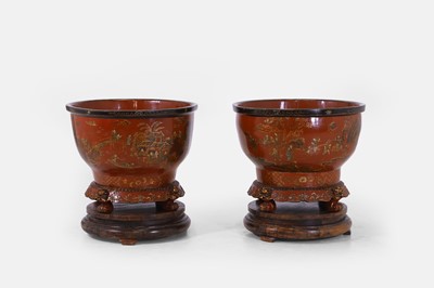 Lot A pair of large Chinese-style red-and-gilt japanned wooden jardinières