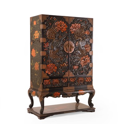 Lot A carved lacquered cabinet