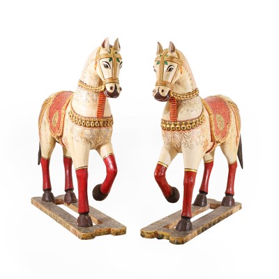 Lot A pair of large lacquered and painted wooden horses