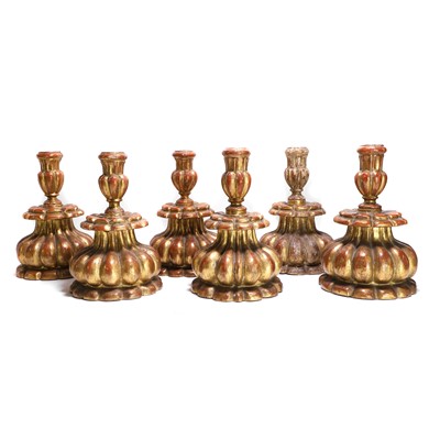 Lot 242 - A set of six carved giltwood candlesticks
