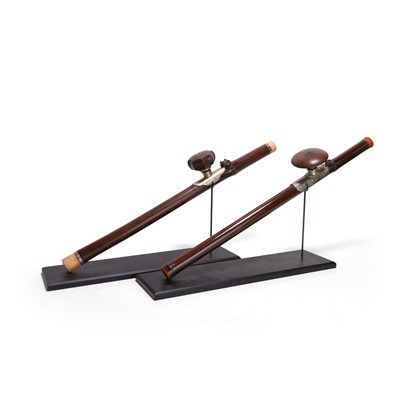 Lot 88 - Two opium pipes