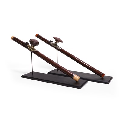 Lot 88 - Two opium pipes