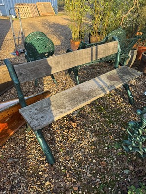 Lot 542 - A cast iron and wood bench