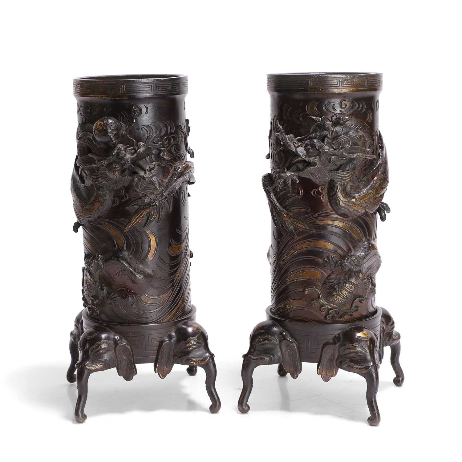 Lot 63 - A pair of bronze cylindrical vases