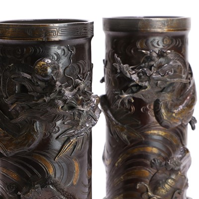 Lot 63 - A pair of bronze cylindrical vases