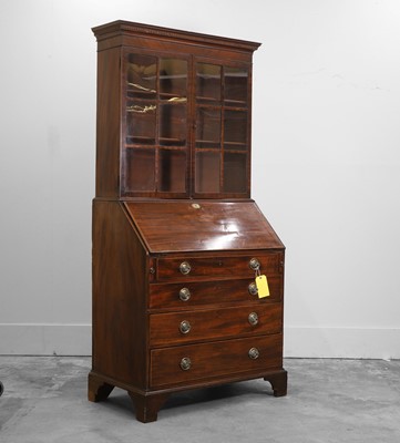 Lot 507 - A late George III mahogany bureau bookcase