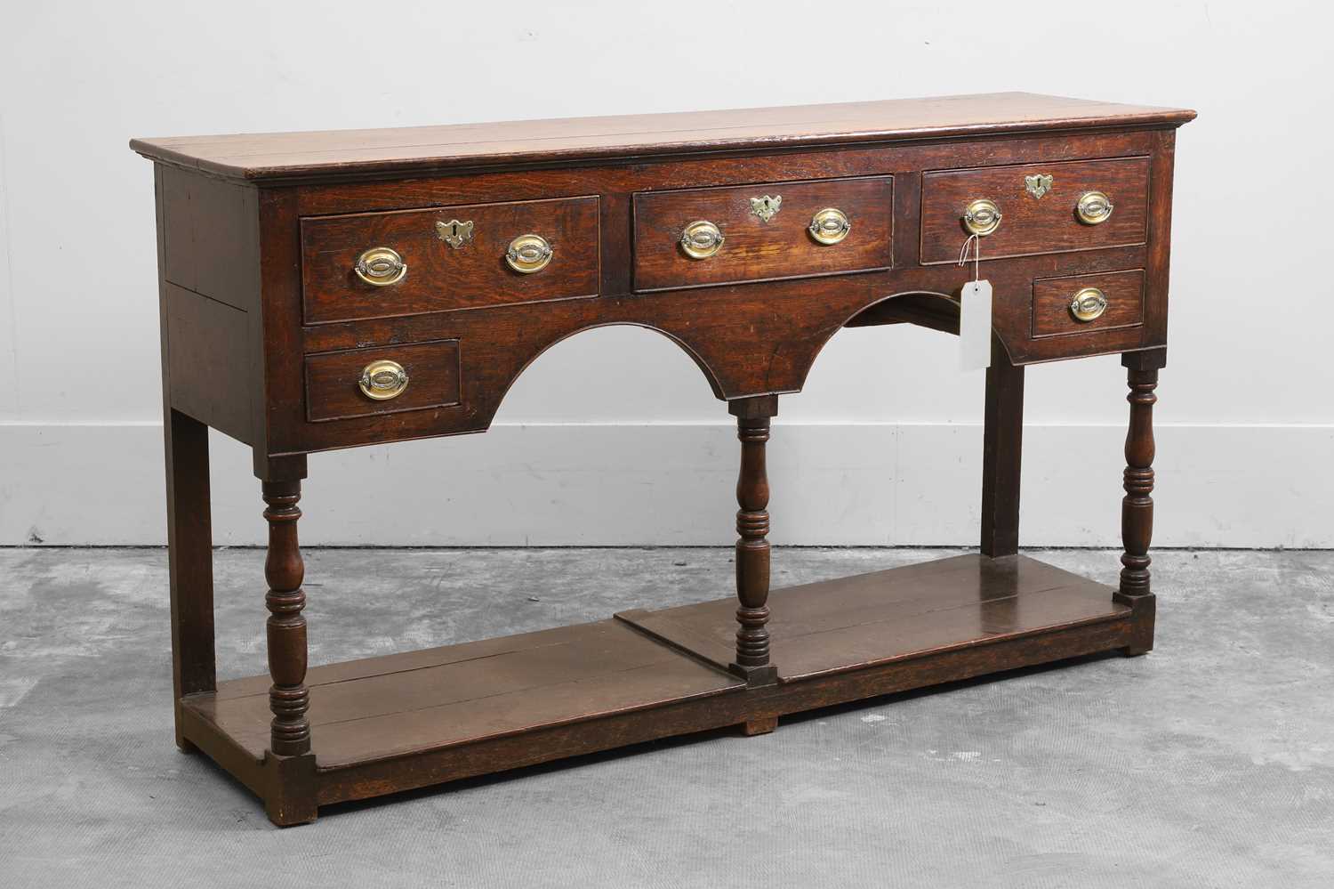 Lot 509 - A George III oak dresser base