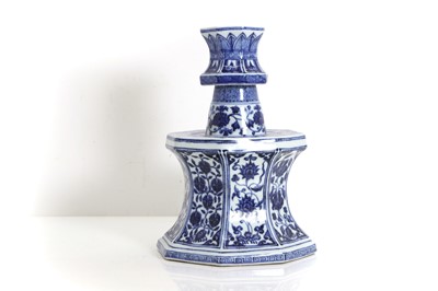 Lot 57 - A Ming style porcelain candlestick