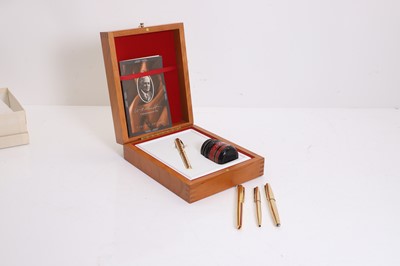 Lot 305 - A collection of four pens