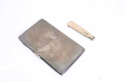 Lot 5 - A silver cigarette case and penknife
