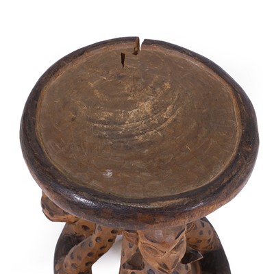 Lot 102 - A Bamileke wooden stool