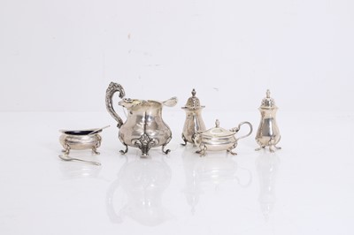 Lot 49A - A four-piece silver condiment set