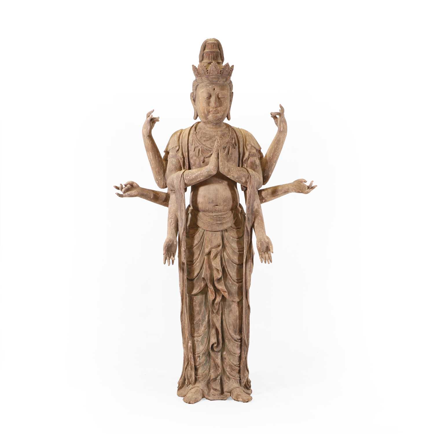 Lot 4 - A carved wood and gesso moulded figure of the eight-armed Avalokiteshvara