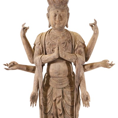 Lot 4 - A carved wood and gesso moulded figure of the eight-armed Avalokiteshvara