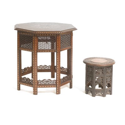 Lot 129 - A carved hardwood occasional table