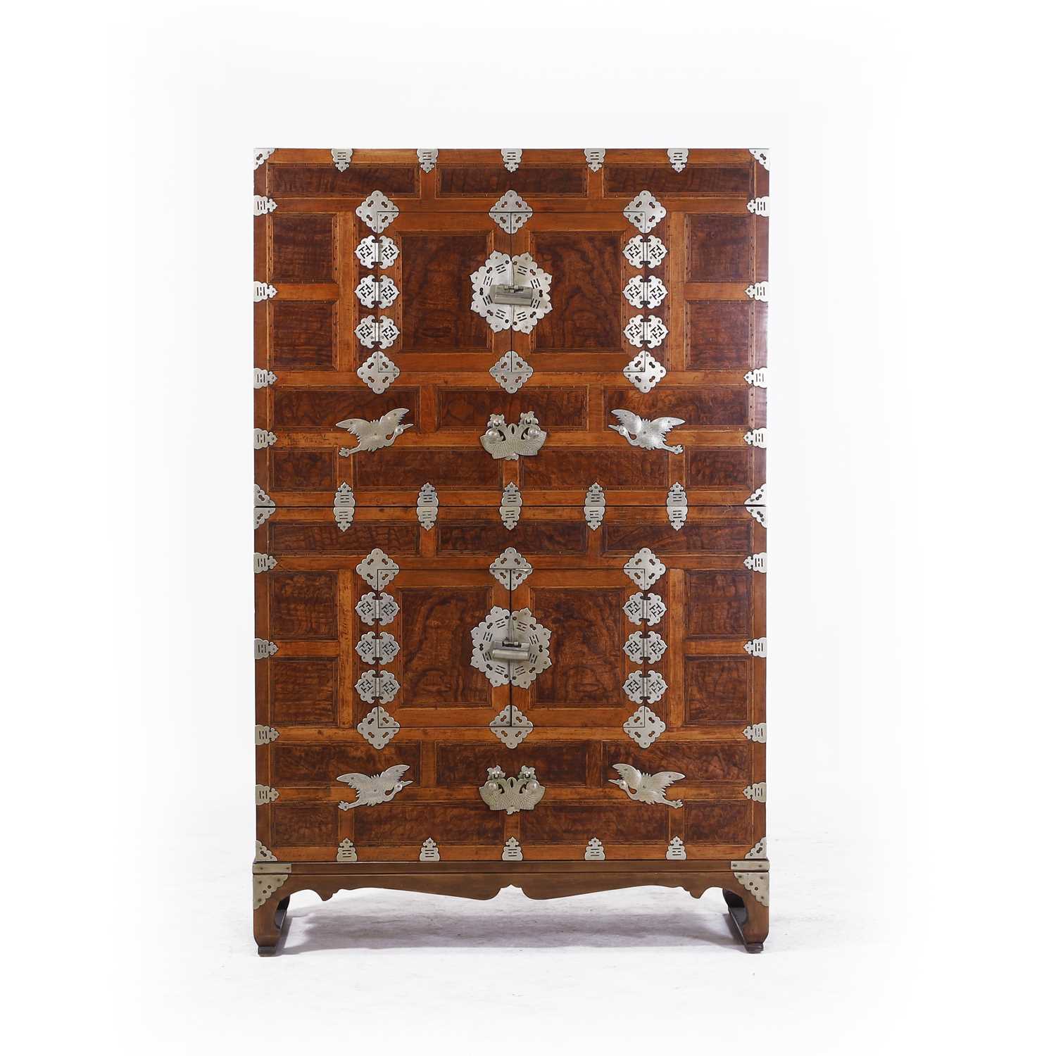 Lot 70 - A pear wood, paulownia and white-metal-mounted 'ich un nong' stackable cabinet