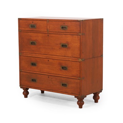 Lot 219 - A teak and gilt-brass campaign chest of drawers by Army & Navy CSL