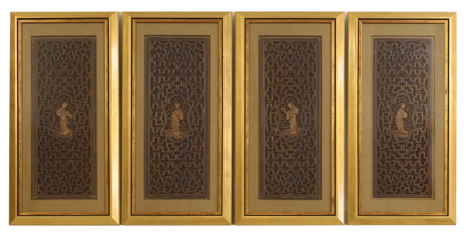 Lot 89 - A set of four pierced and lacquered screen panels