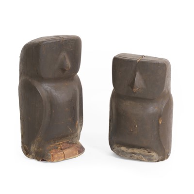 Lot 145 - Two carved wooden owls