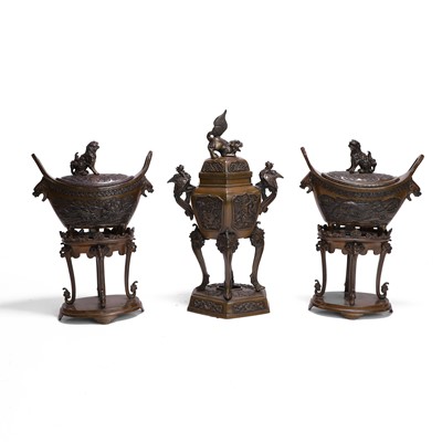 Lot 59 - A bronze garniture