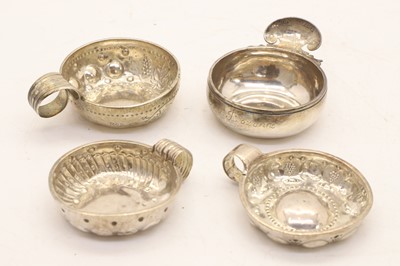 Lot 46 - Four silver taste de vin