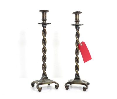 Lot 307 - A pair of brass candlesticks