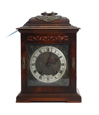 Lot 201 - A wooden cased bracket clock