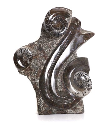 Lot 310 - A large decorative ammonite fossil fragment